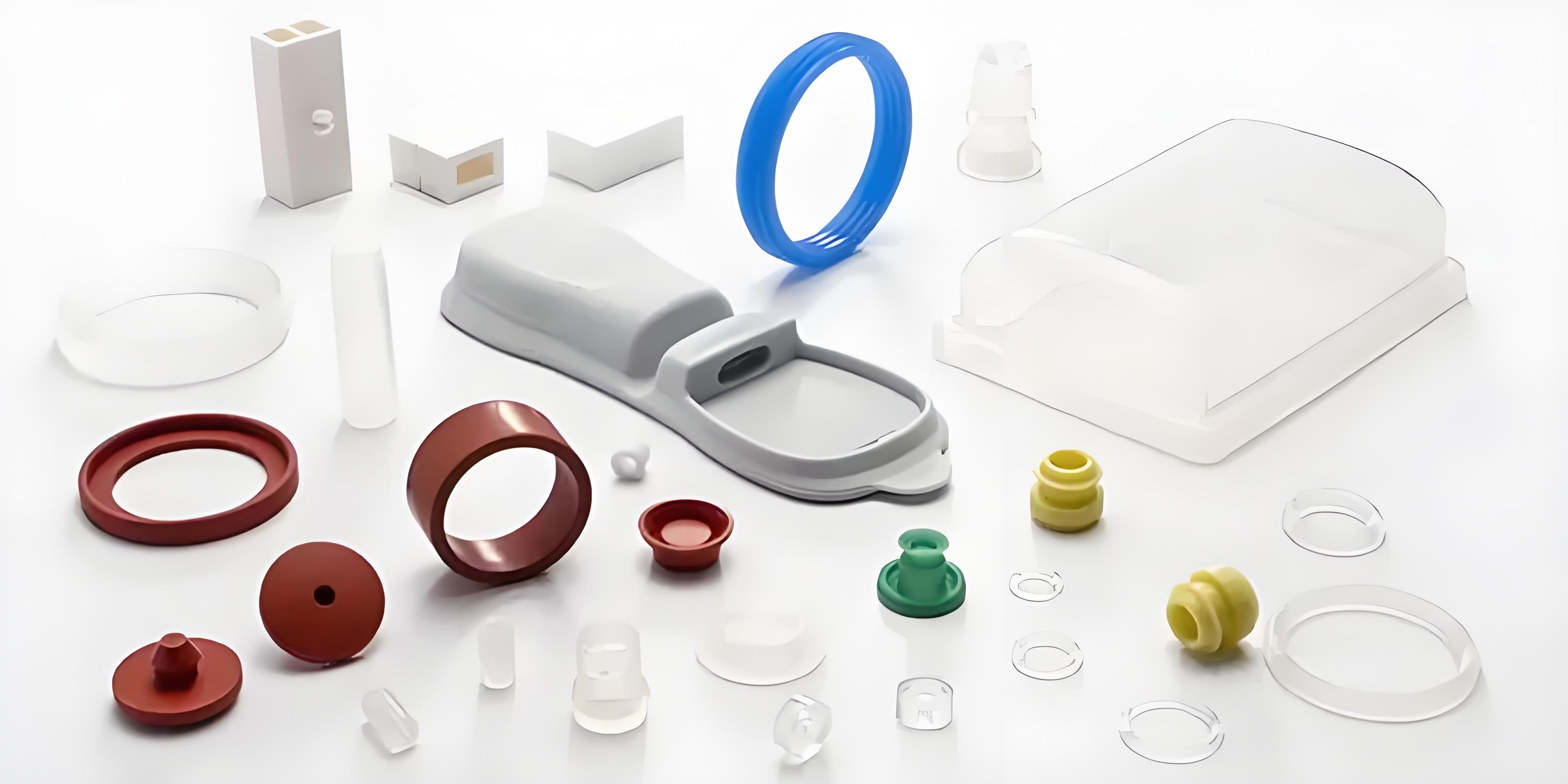 Close-up of LSR injection molding process showing machinery and silicone components.