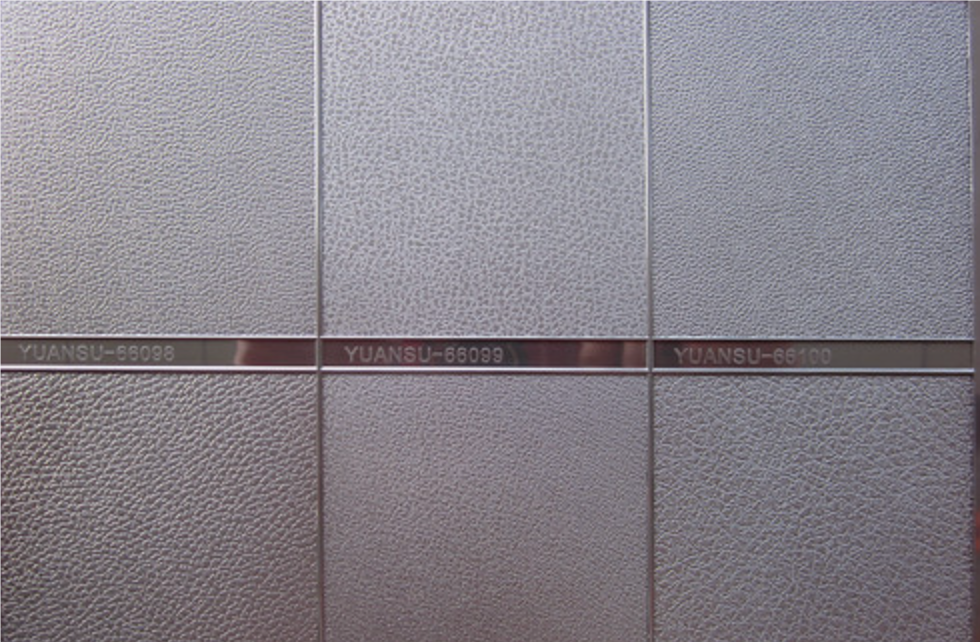 Close-up view of a highly polished injection mold surface, demonstrating different textures and finishes according to SPI and VDI standards.