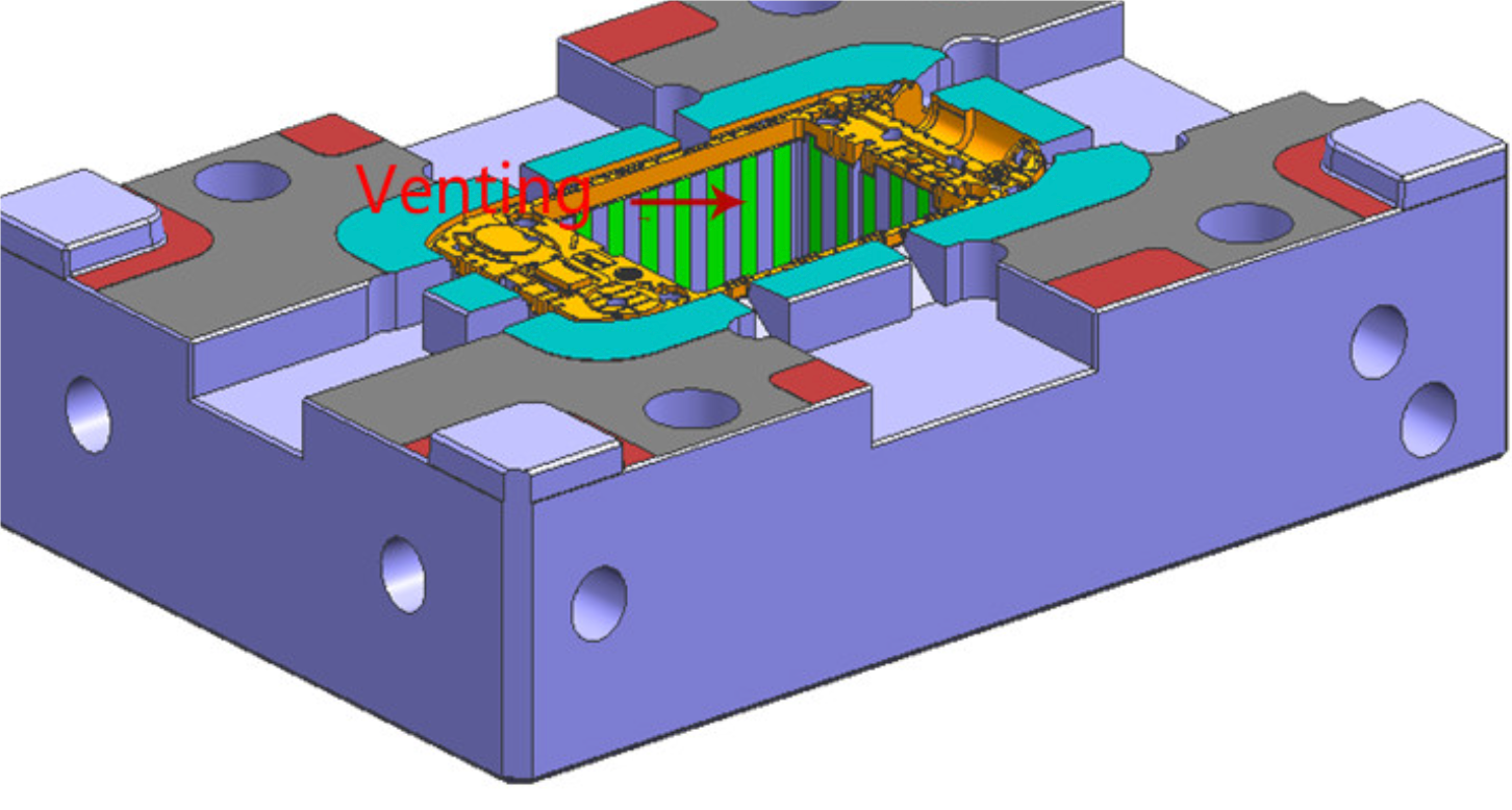 Close-up view of injection molding machine focusing on runner system